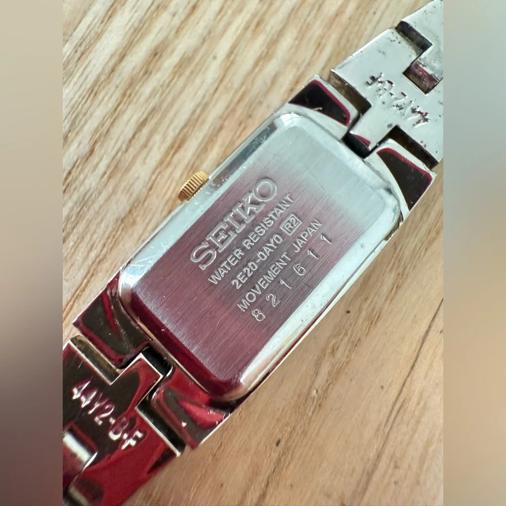 Seiko ladies two tone rectangular black dial dress watch NEW BATTERY